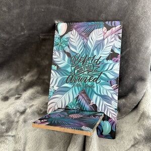 Fairyloot wooden phone stand. Raybearer by Jordan Ifueko inspired.